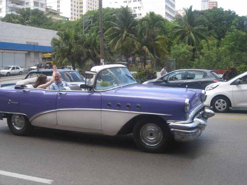 purple vintage car in havana